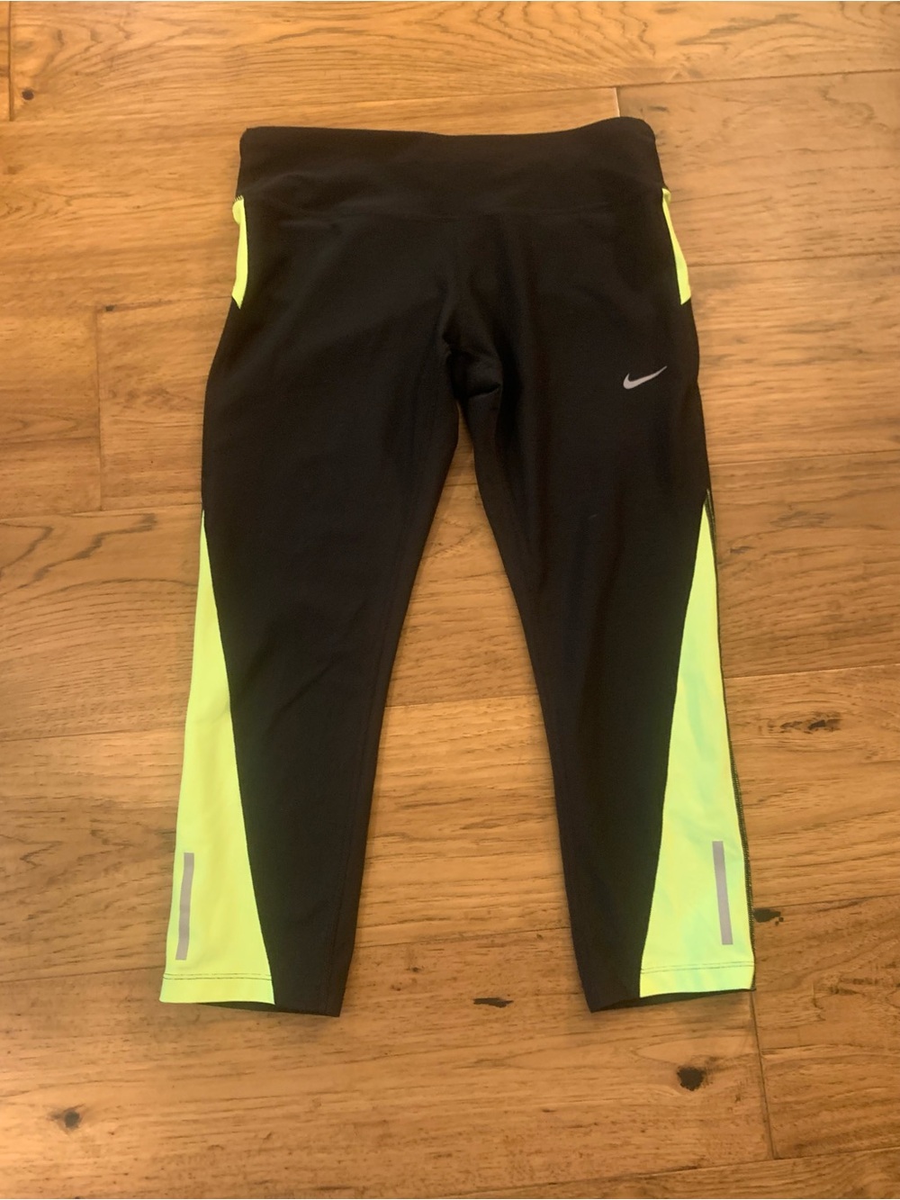 Nike women’s ' Black and Neon Yellow Capri Performance Leggings